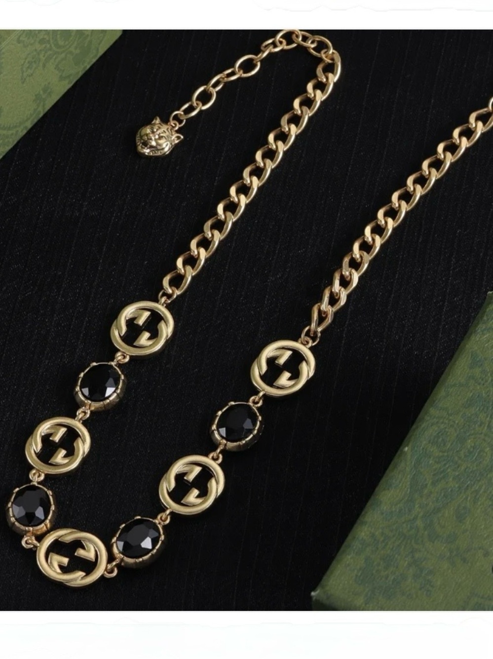 GUCCI Gold Chain Necklace with Black Gem Accents